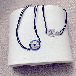 2 bracelets (Hamsa hand and round blue crystal) with string band